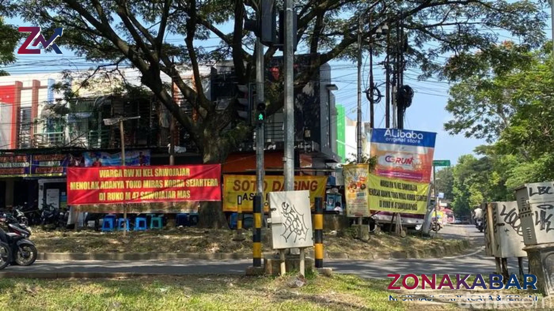 Gejolak di Sawojajar Malang: Warga Bentangkan Banner Penolakan Keras Terhadap Operasional Toko Miras Kobra Sejahtera